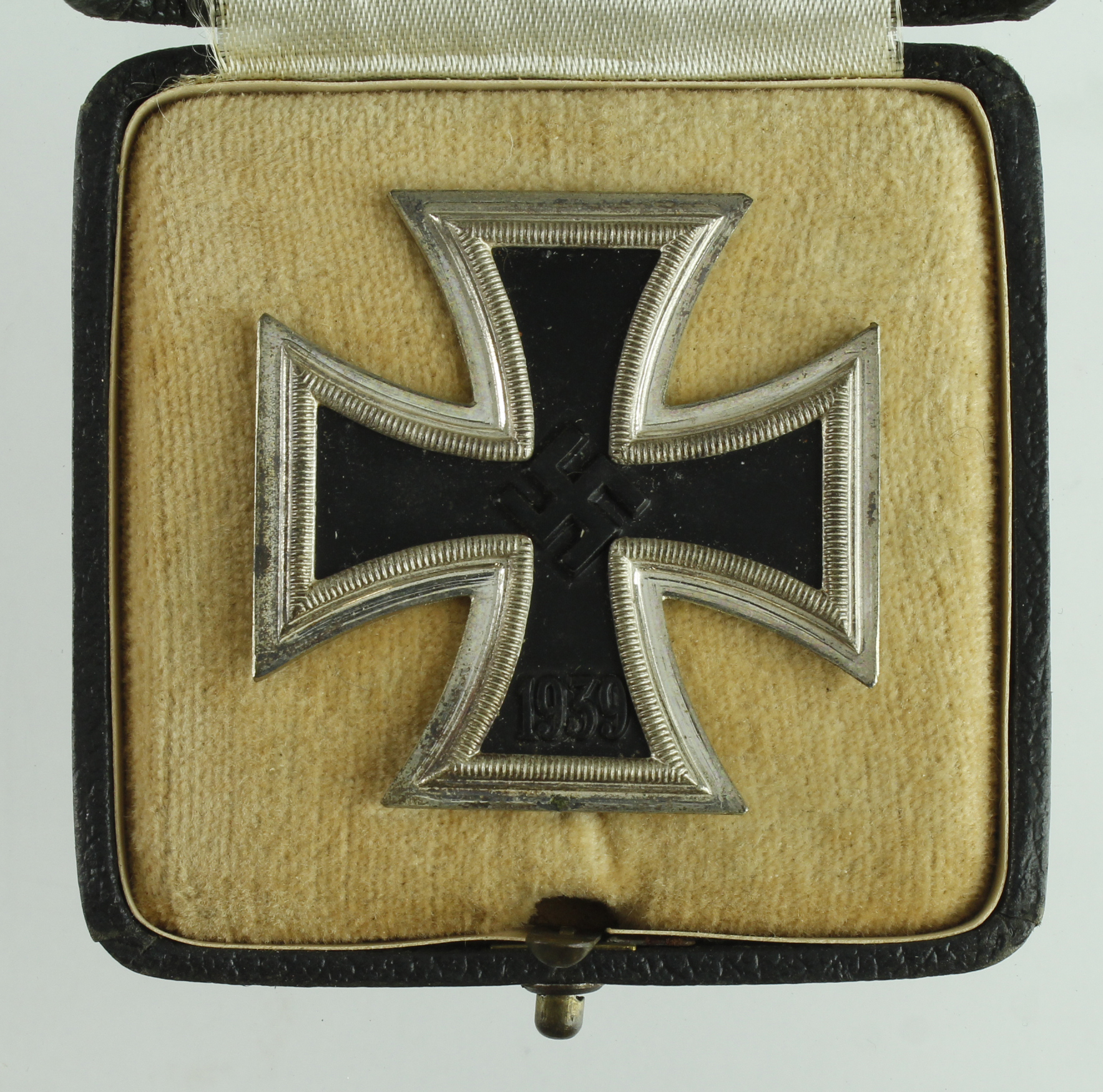 German 3rd Reich Iron Cross 1st Class in case of issue, cross maker marked '15'.