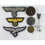 German Third Reich insignia, eagles and tinnies.