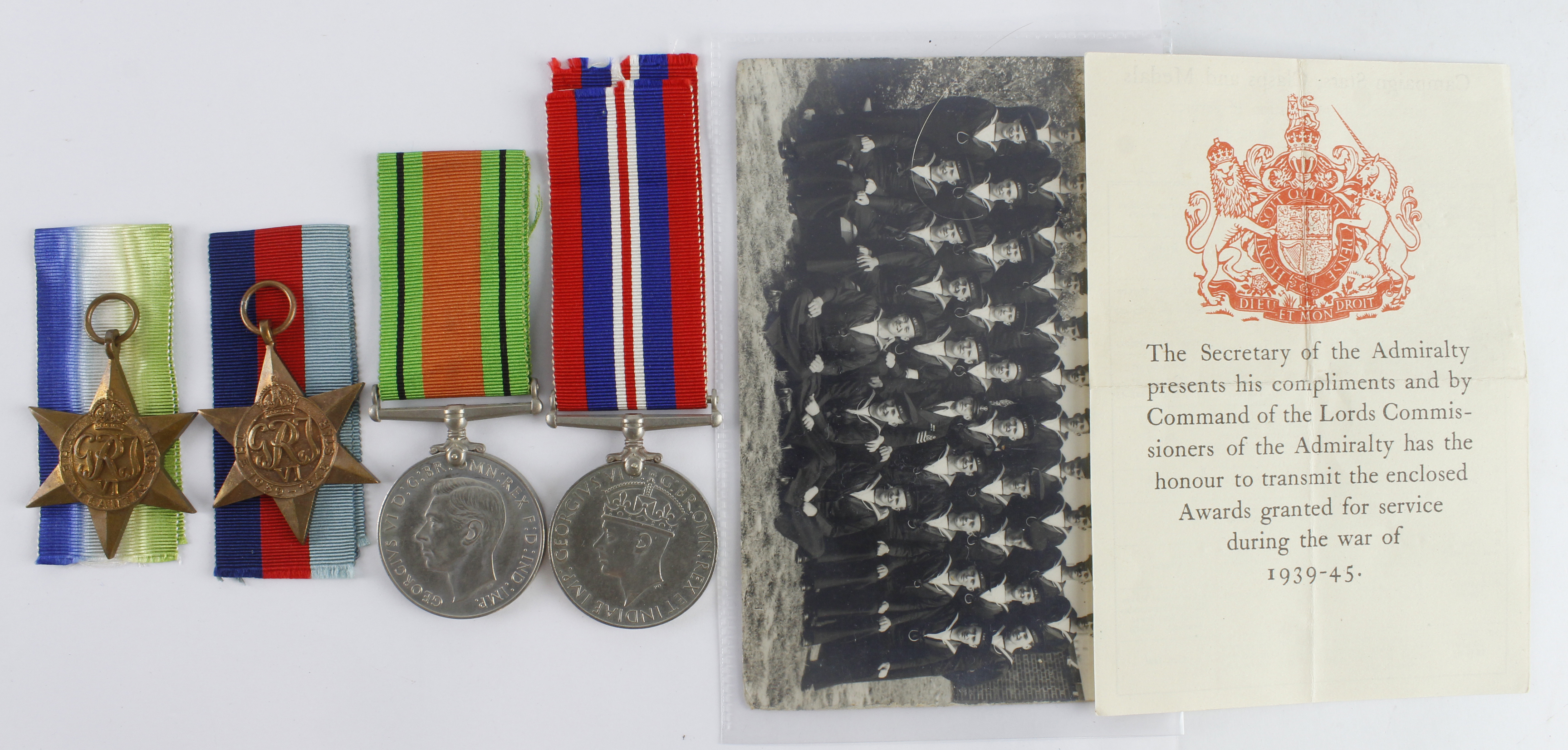 WW2 Royal Naval group with 1939-45 star, Atlantic star, Defence and War medal HMS Europa badge,
