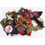 Cloth Badges: British Army WW2 and later formation signs, shoulder titles, and rank badges, all in