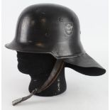 German Fire Police steel helmet with protective heat flap and chin strap a/f, double decals.