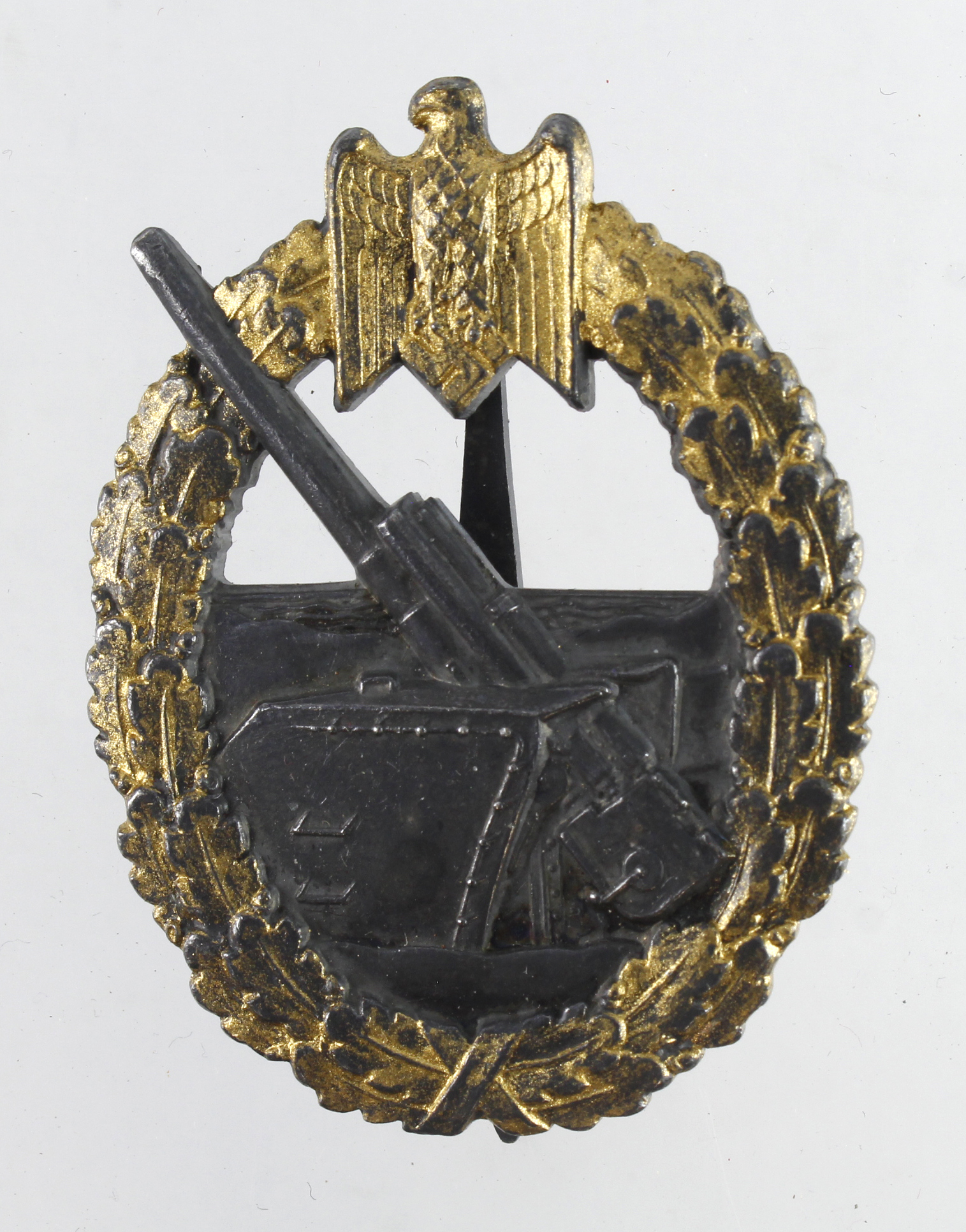 German from a one owner collection a Navy Kriegsmarine war badge, Coastal Artillery, S.H u Co