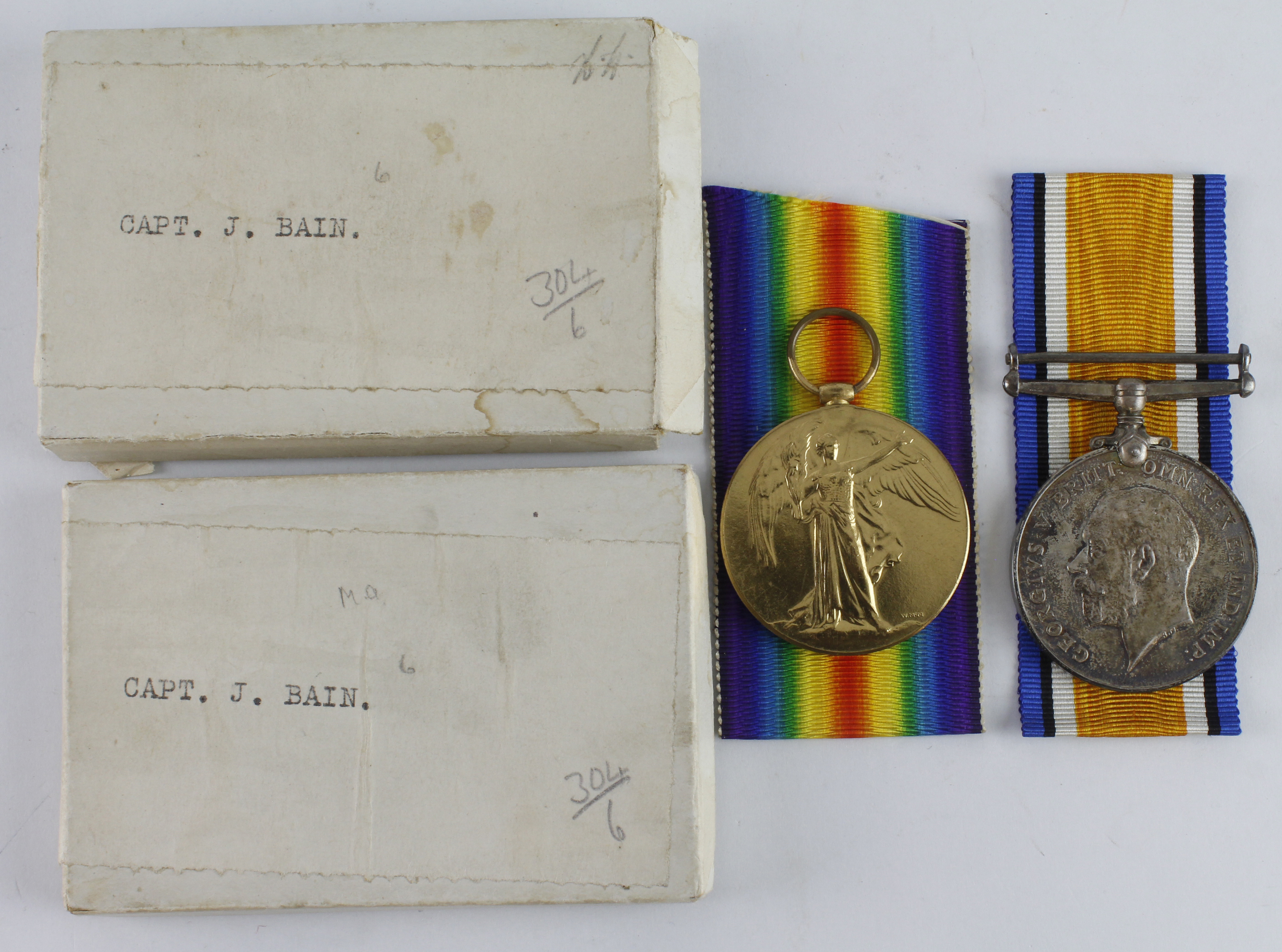 BWM & Victory Medal (Capt J Bain) with named boxes of issue. Served RAMC. Entitled to the Silver War