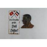 German Hitler interest, an enamel wall plaque and alloy head and shoulders bust of Hitler.