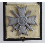 Germany from a one owner collection, a War Merit Cross 1st class with swords in fitted case.