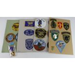 America a Purple Heart together with a selection of USA Seal Team and scarce special patches / cloth