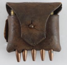 Ammunition pouch (from a Bandoleer or Belt) with a 5 round Mauser clip, leather fractured across