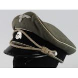 German Waffen SS Officers peaked cap. Odd moth nip. Service wear.