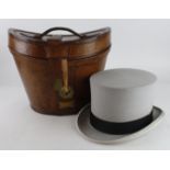 Top Hat. A grey top hat by Woodrow, Piccadilly, contained in contemporary leather hat box, head size