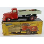 Distler Electromatic 8000FS tinplate battery tipper truck (red cab, green back), damage to battery