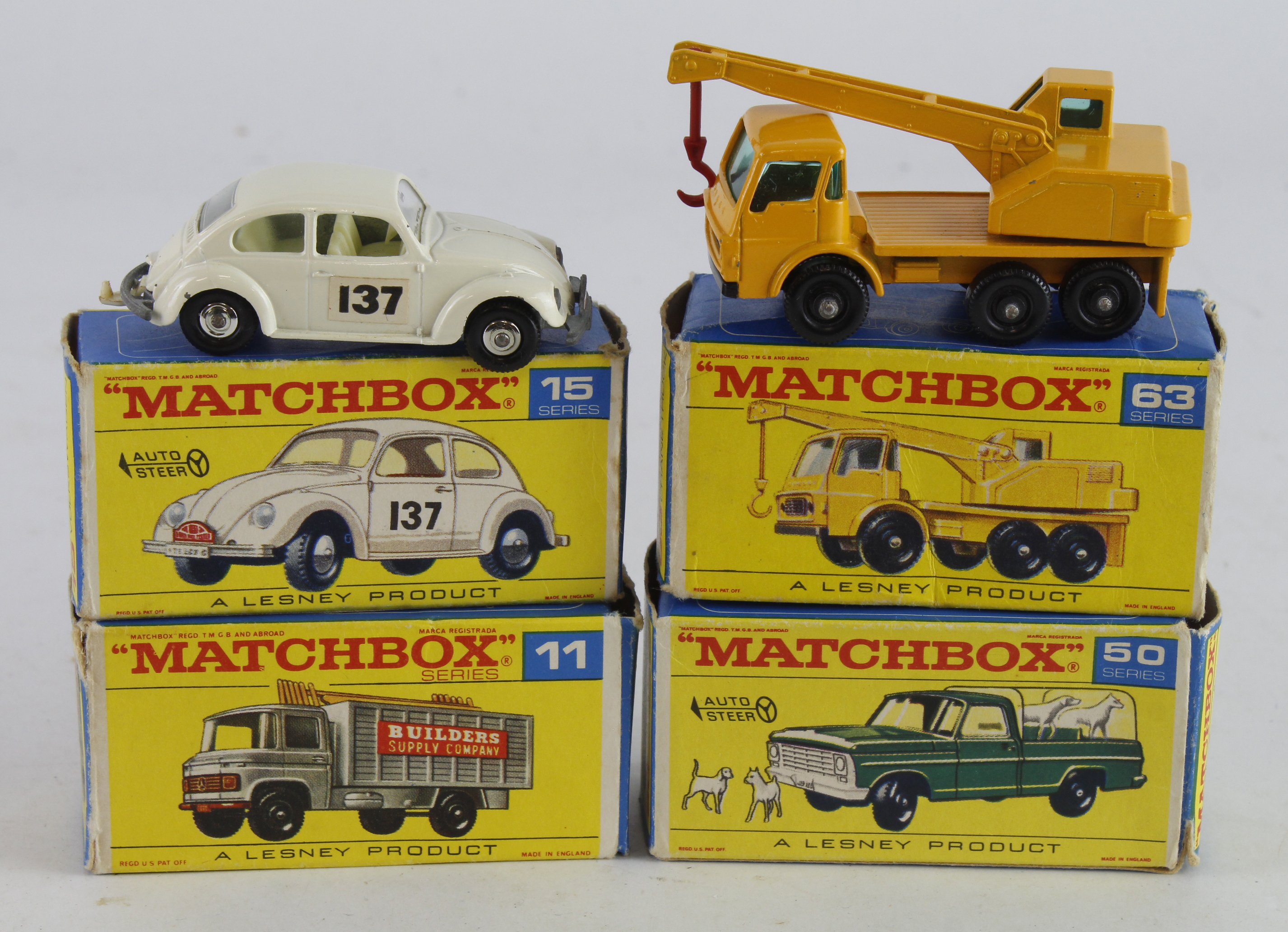 Matchbox. Four boxed Matchbox Lesney models, comprising Scaffolding Truck (no. 11); Volkswagen (15);