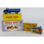 Dinky Toys. Four boxed Dinky Models, comprising Farm Tractor & Hay Rake (no. 310); Comet Wagon
