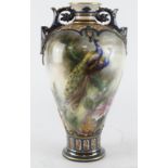 Hadleys Worcester hand painted twin handled vase, decorated with peacocks, signed by 'W. Powell',