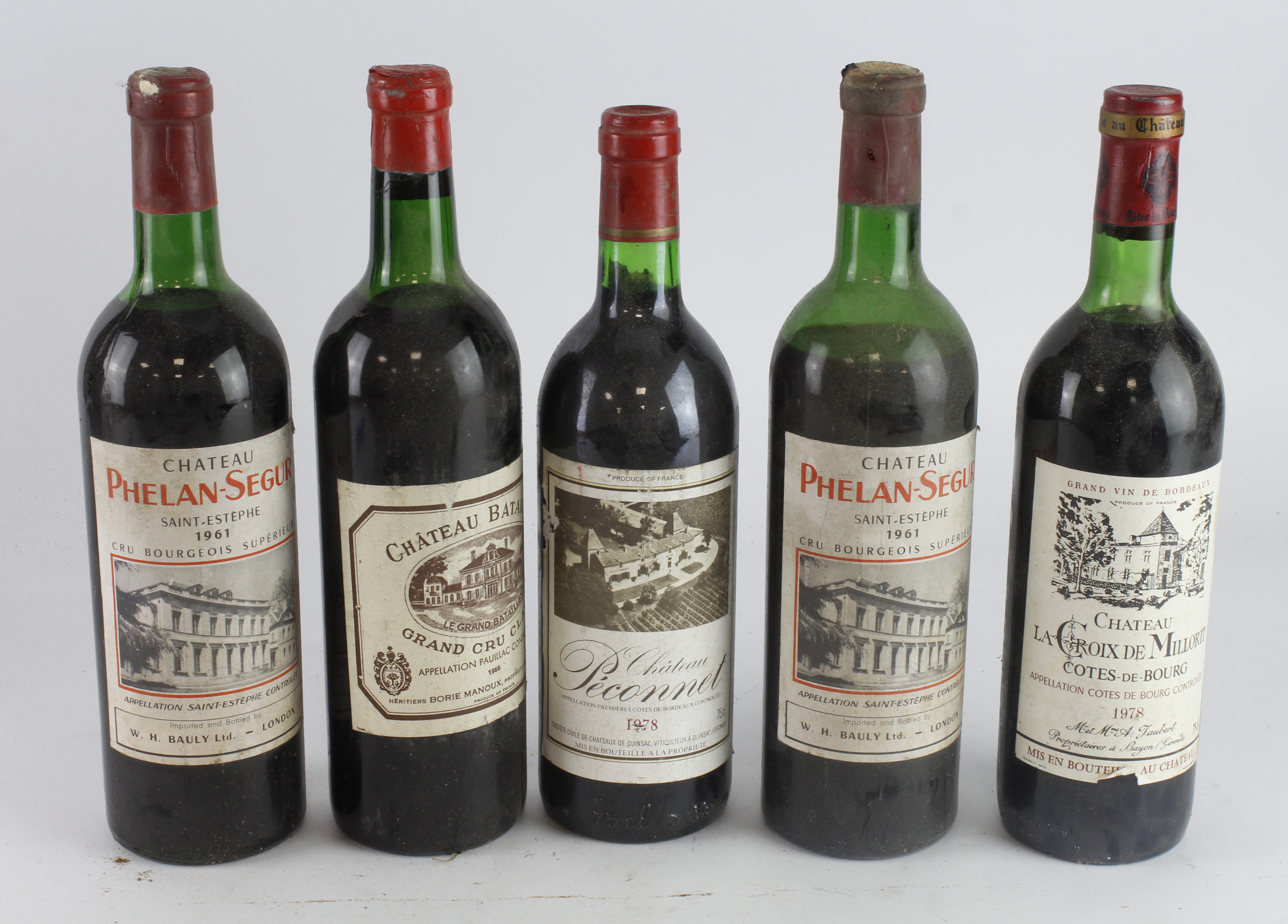 France. Five bottles of French wine, comprising Chateau Phelan Segur Saint Estephe 1961 (x2);