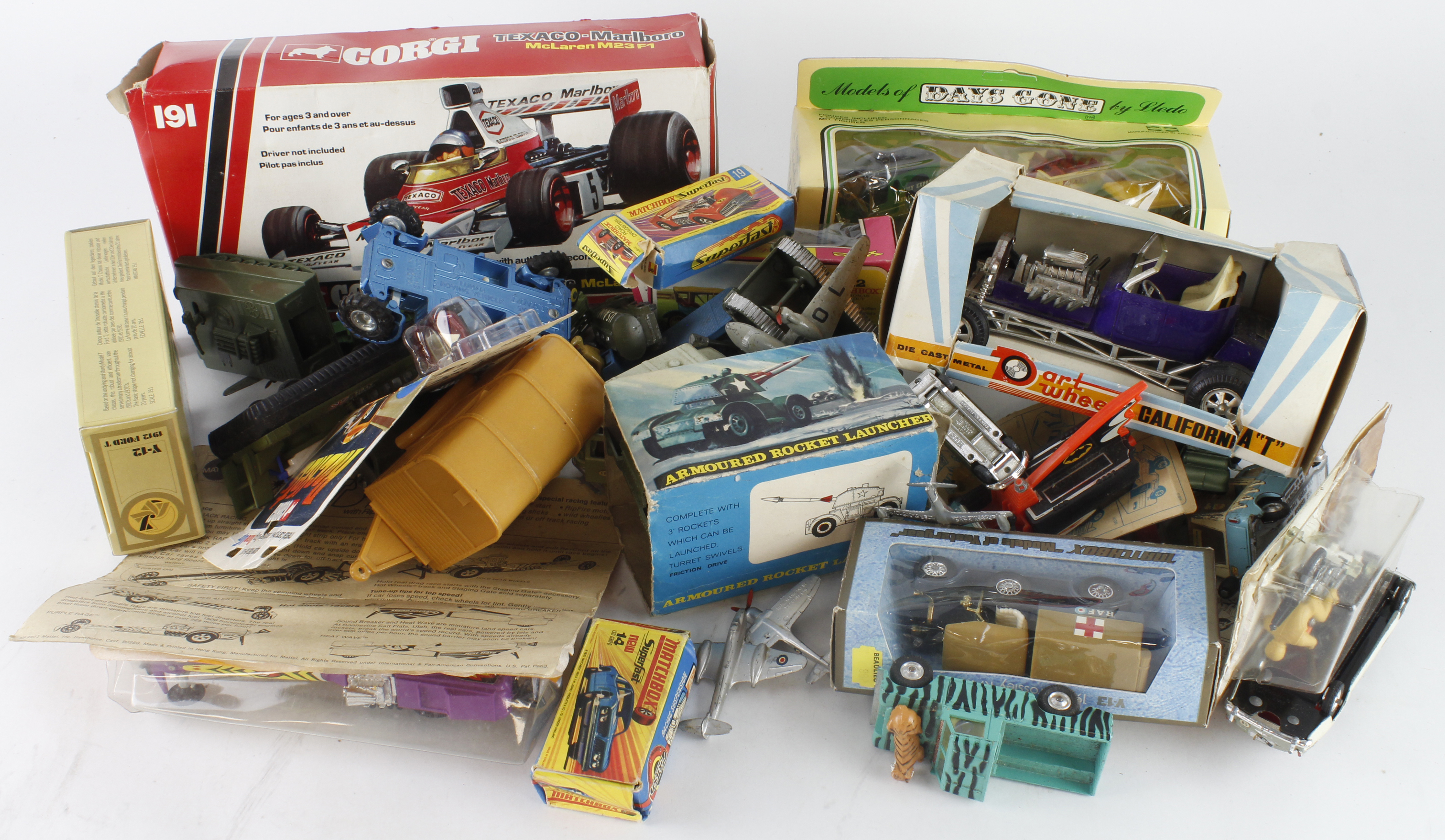 Diecast. A collection of various diecast models, including Corgi, Matchbox, Hot Wheels, etc. (some