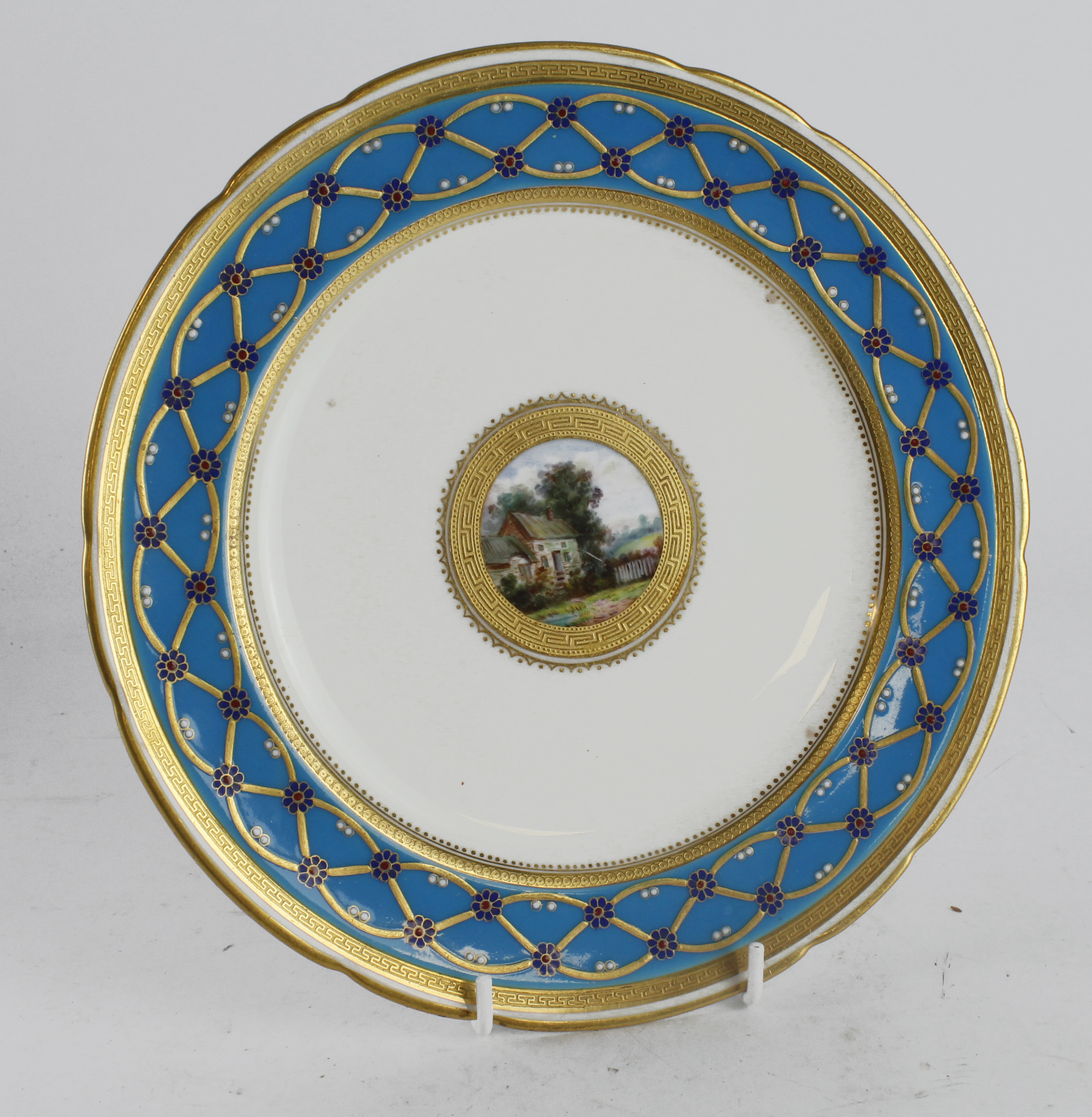 Minton cabinet plate, with blue and gilt floral decorated surround with central hand painted