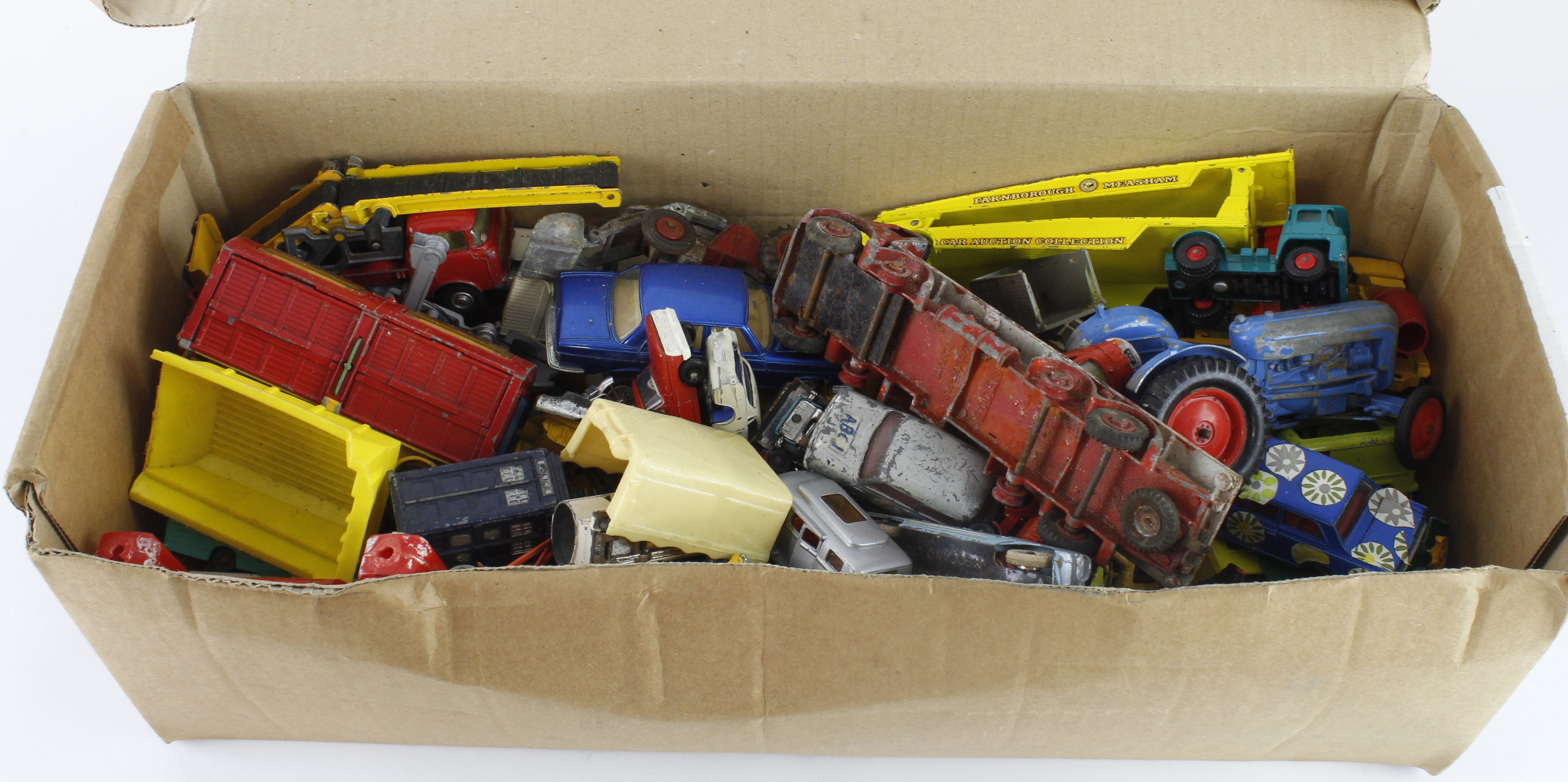 Diecast. A box of playworn diecast models, including Corgi, Matchbox Lesney, Dinky, etc.