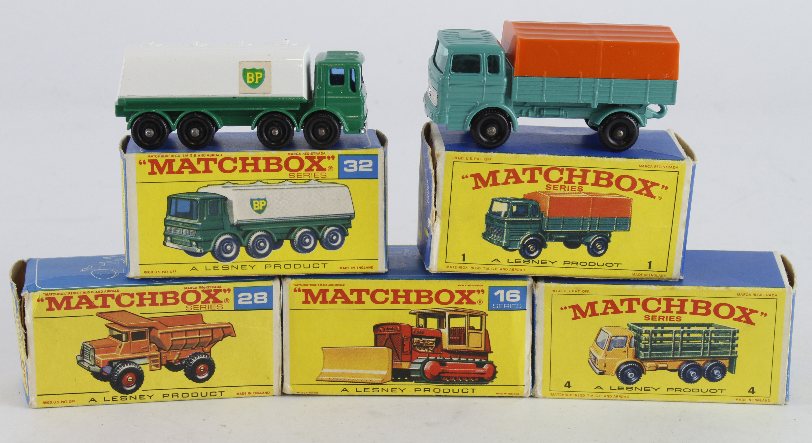 Matchbox.. Five boxed Matchbox Lesney models, comprising Mercedes Truck (no. 1); Stake Truck (4);