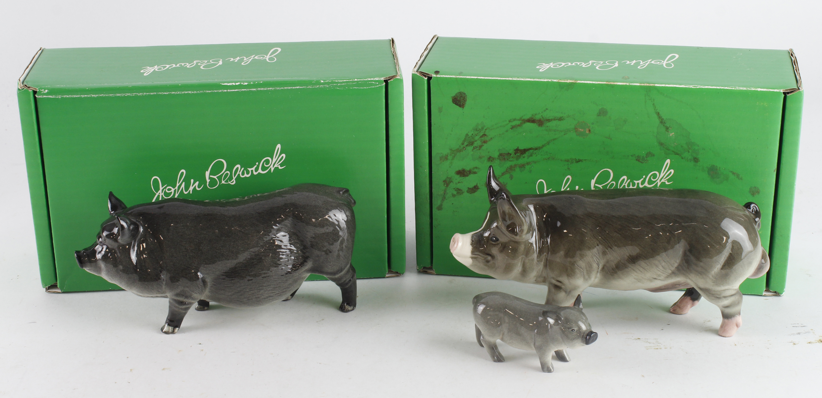 Beswick. Three Beswick figures, comprising Berkshire Boar, Pot Bellied Pig & Piglet (in two boxes,