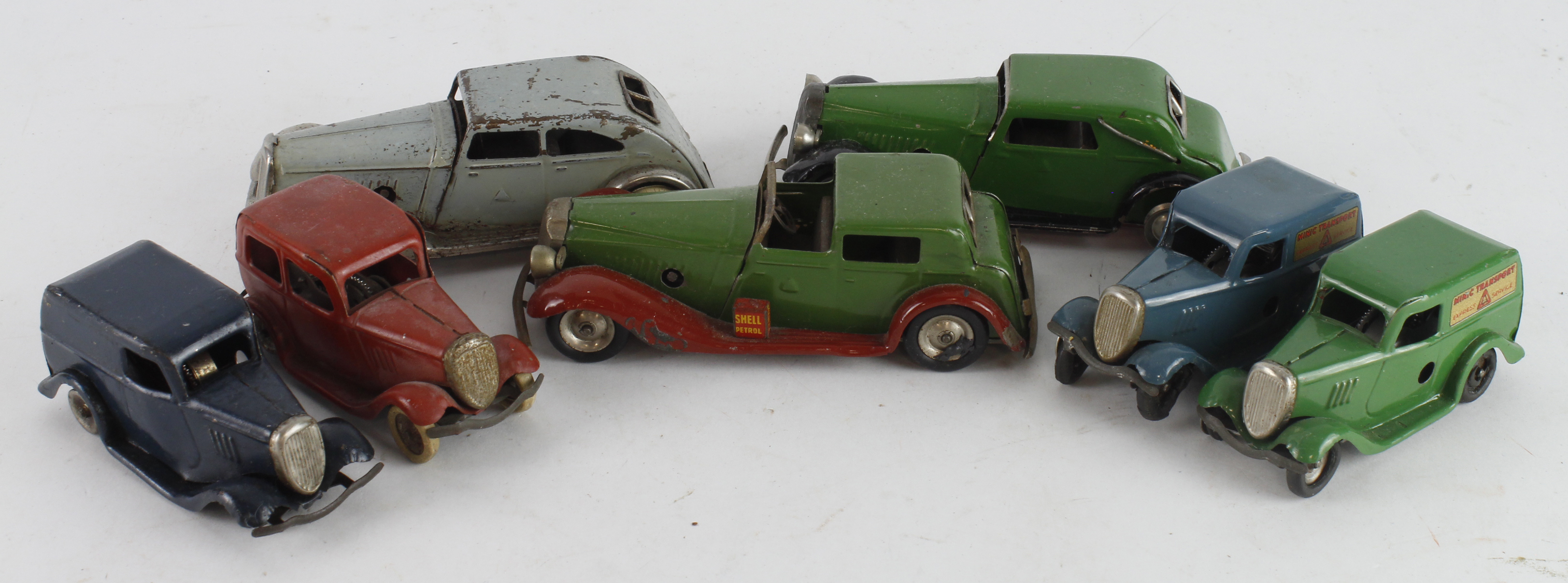 Triang Minic. Seven Triang Minic tinplate clockwork cars & vans (untested)