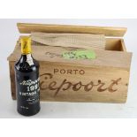 Niepoort. Four bottles of Niepoorts Vintage Port 1991 (bottled December 1993), contained in original