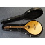 Morgan Lewis octave mandolin in Sapele, no. OM157, makers label to inside, back length 45cm approx.,