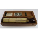 Fuller Calculator with bakelite handle, length 44cm approx., contained in original fitted case