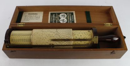 Fuller Calculator with bakelite handle, length 44cm approx., contained in original fitted case