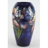 Moorcroft Orchid pattern vase, makers marks to base, height 17.5cm approx.