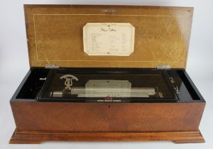 Music Box. Large cased (possibly American Maple) music box (no. 638), circa late Victorian,