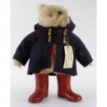 Gabrielle Paddington Bear, with original label, wear to blue coat, height 50cm approx.