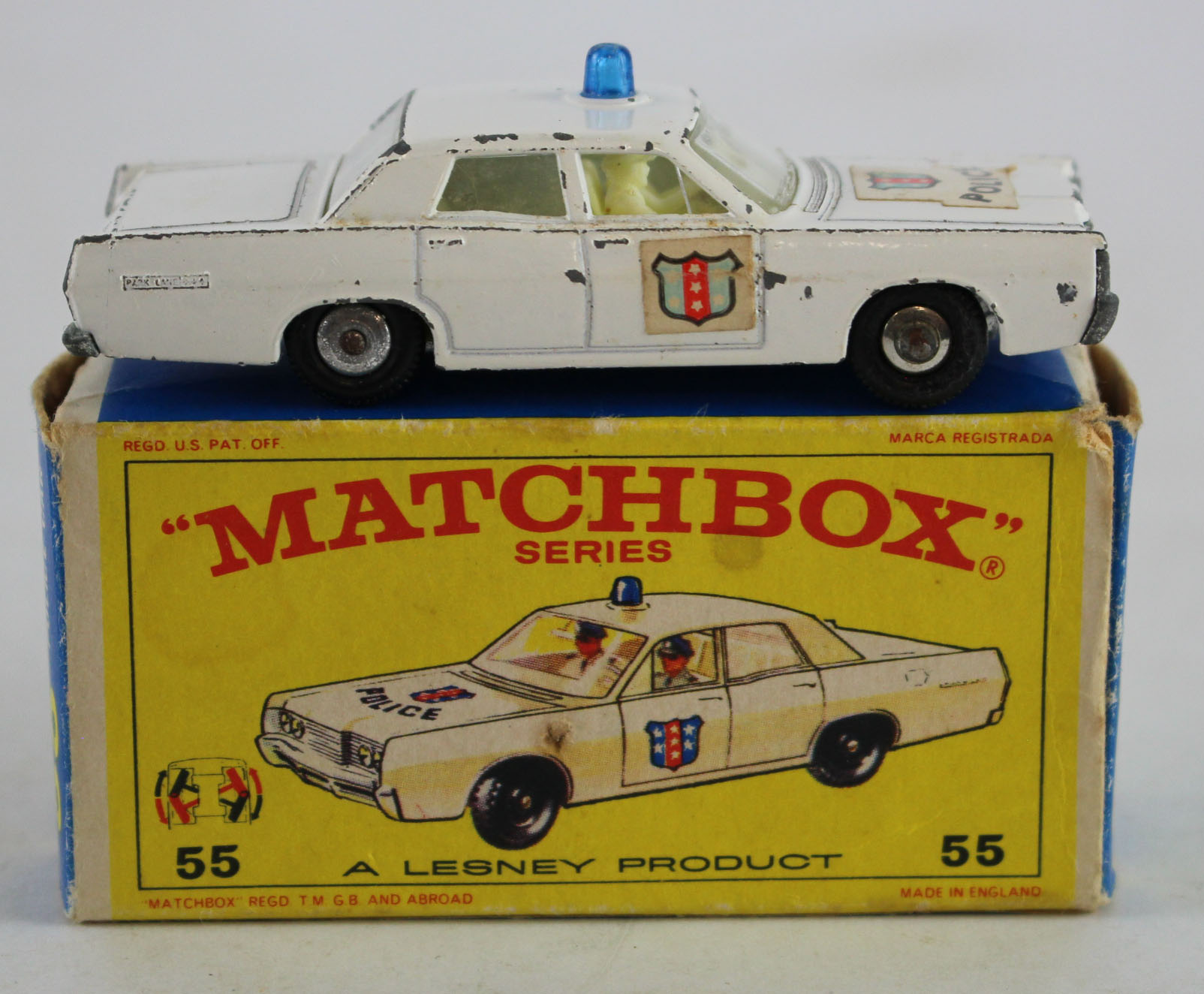 Matchbox Lesney, no. 55 'Police Car' (white with blue roof light), base reads 'Matchbox