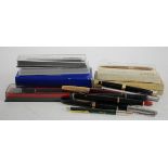 Pens. A collection of approximately twenty fountain pens, ballpoint pens & pencils, makers include