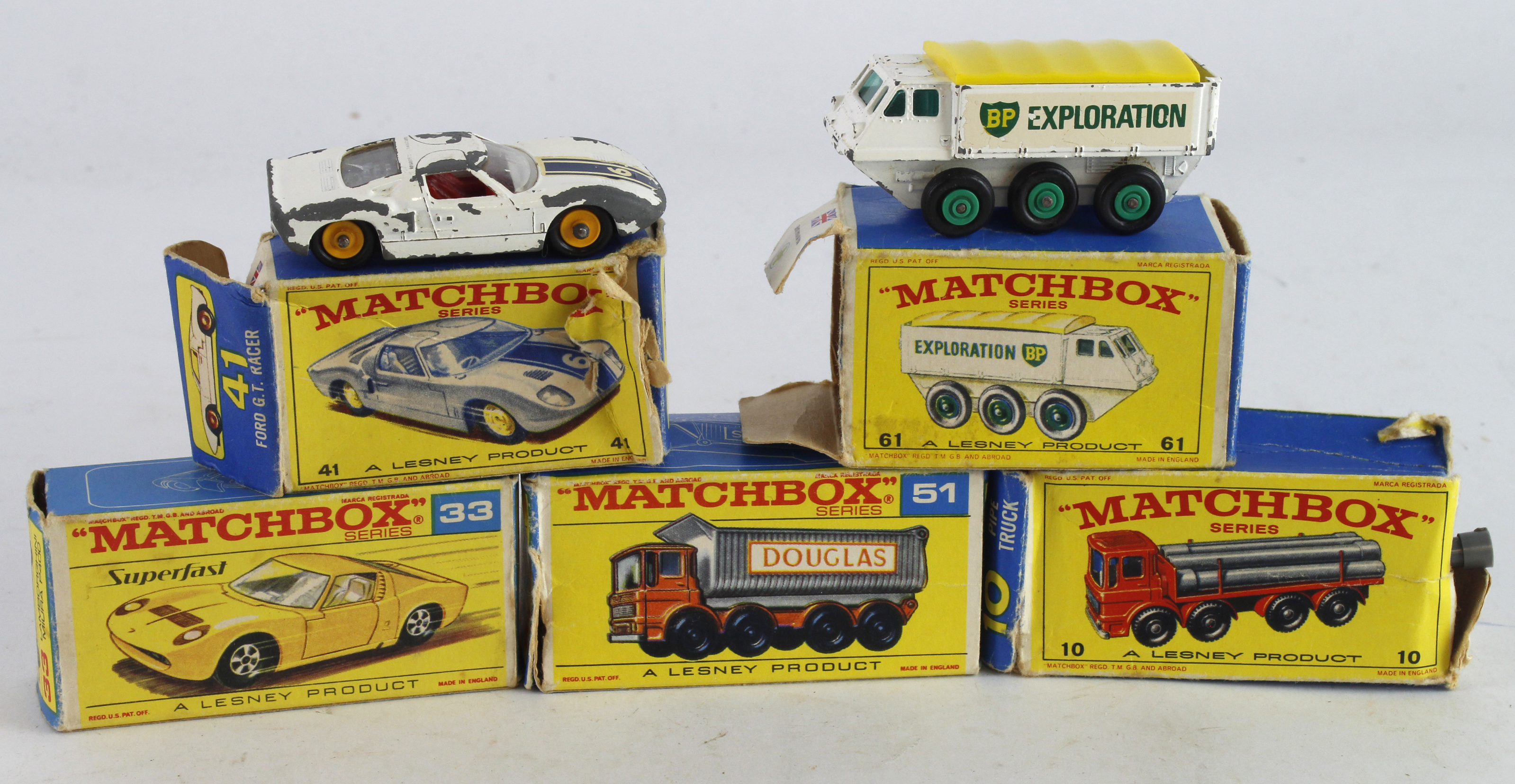 Matchbox.. Five boxed Matchbox Lesney models, comprising Pipe Truck (no. 10); Lamborghini (33); 8