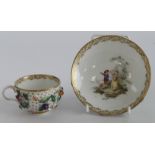 Meissen cup & saucer with ornate floral decoration, saucer bowl decorated with a boy and girl in a