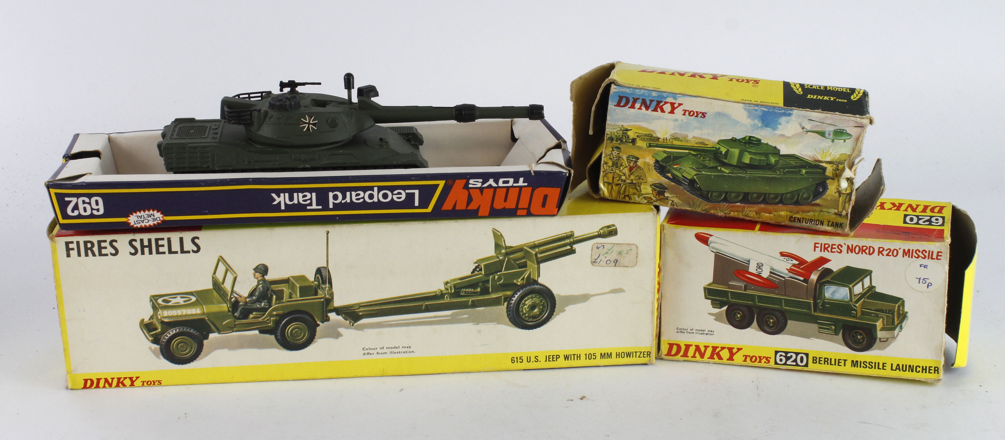 Dinky Toys. Four Dinky Military models, comprising US Jeep with 105mm Howitzer (no. 615); Berliet