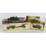 Dinky Toys. Four Dinky Military models, comprising US Jeep with 105mm Howitzer (no. 615); Berliet