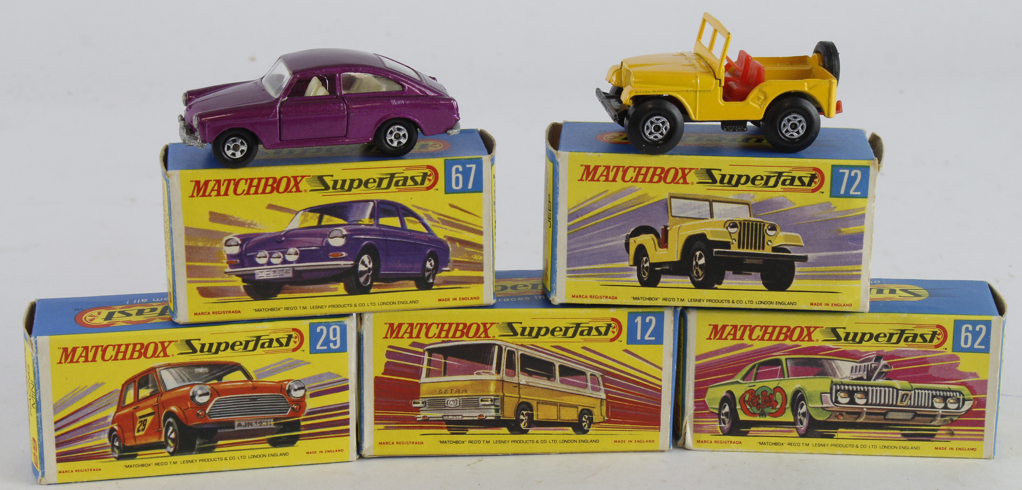 Matchbox. Five boxed Matchbox Superfast models, comprising Setra Coach (no. 12); Racing Mini (29);