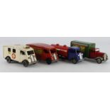 Triang Minic. Four Triang Minic tinplate clockwork lorries and vans, including Carter Paterson,