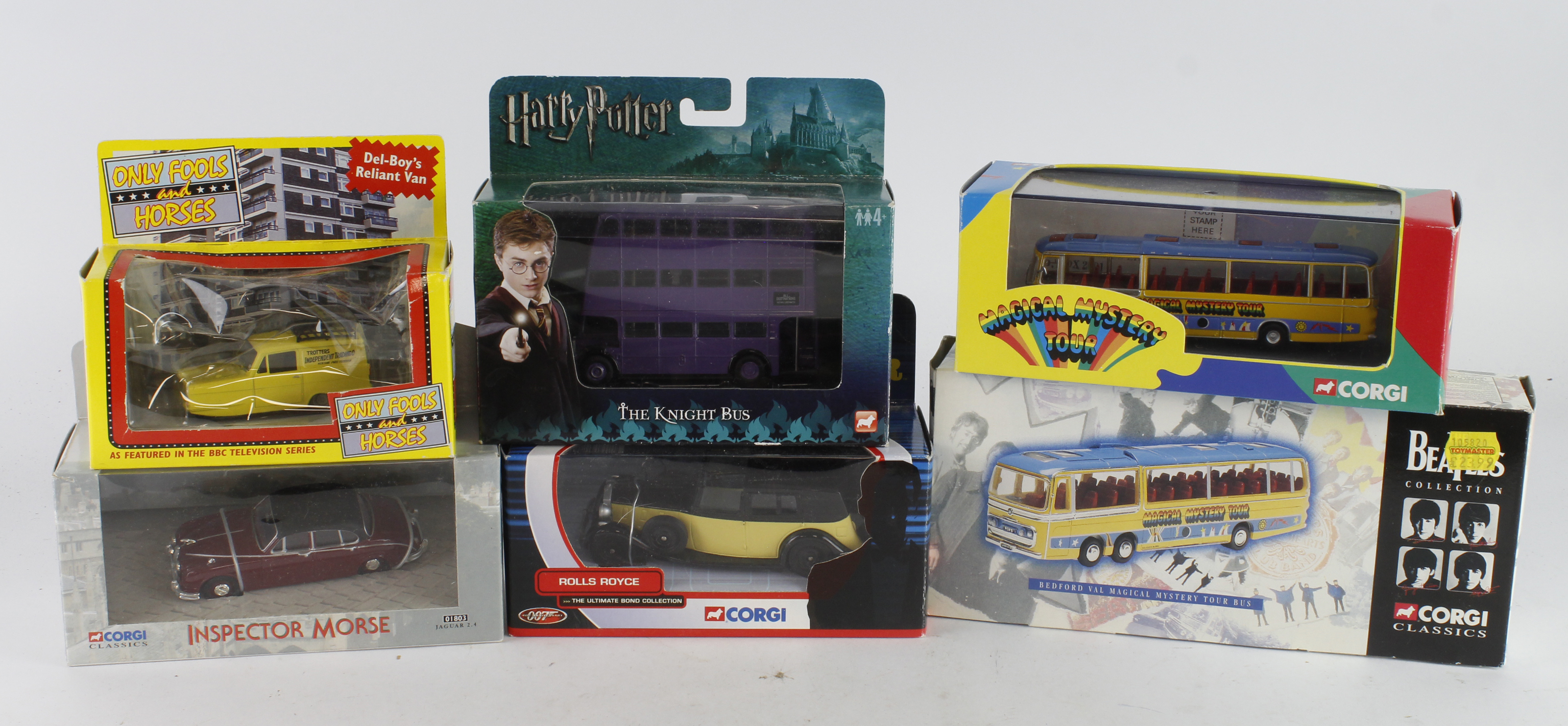 Film / TV related models. A group of six boxed models, including Corgi Beatles Magical Mystery