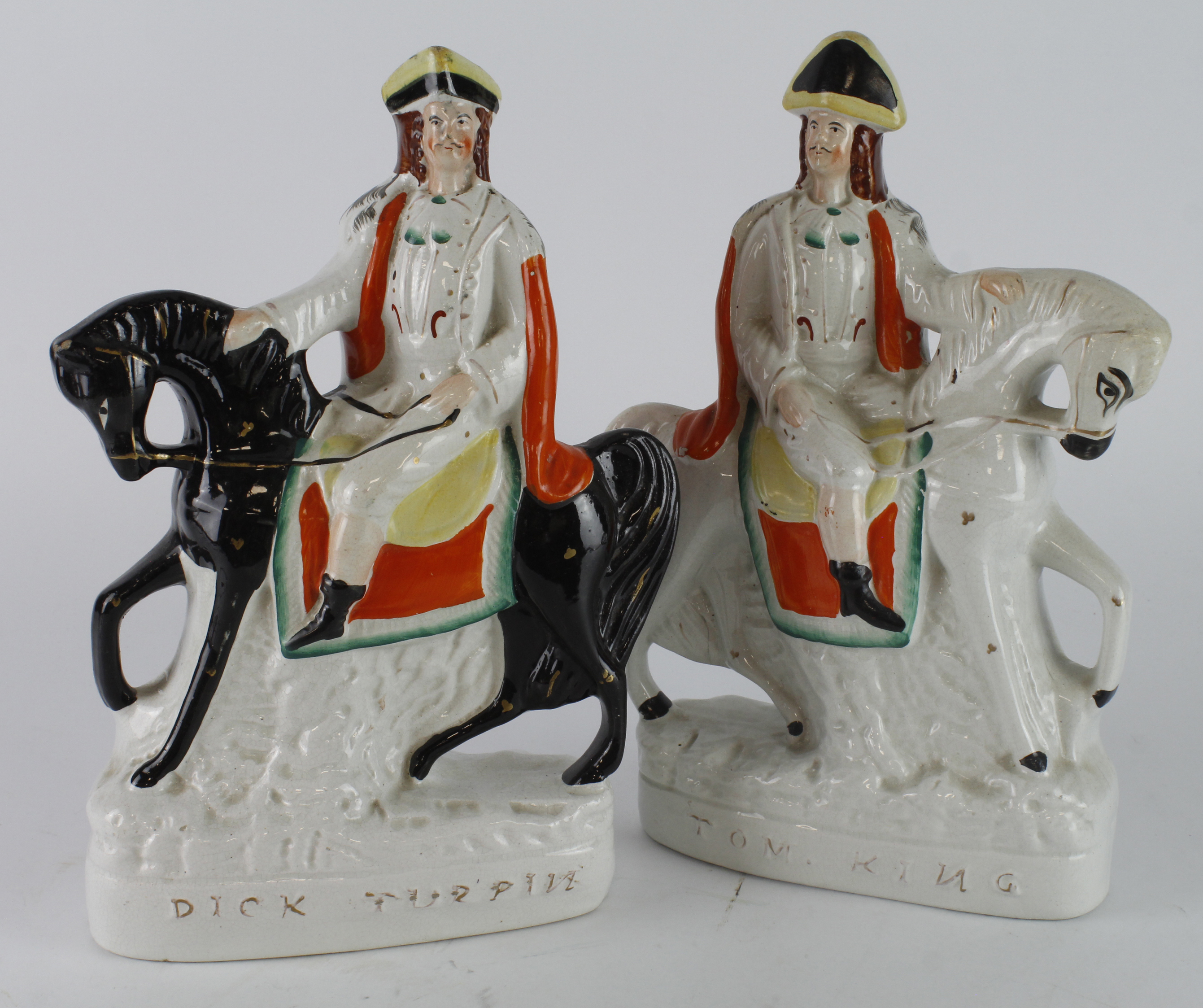 Staffordshire. Two Staffordshire flatback figures, comprising Dick Turpin & Tom King, height 29cm