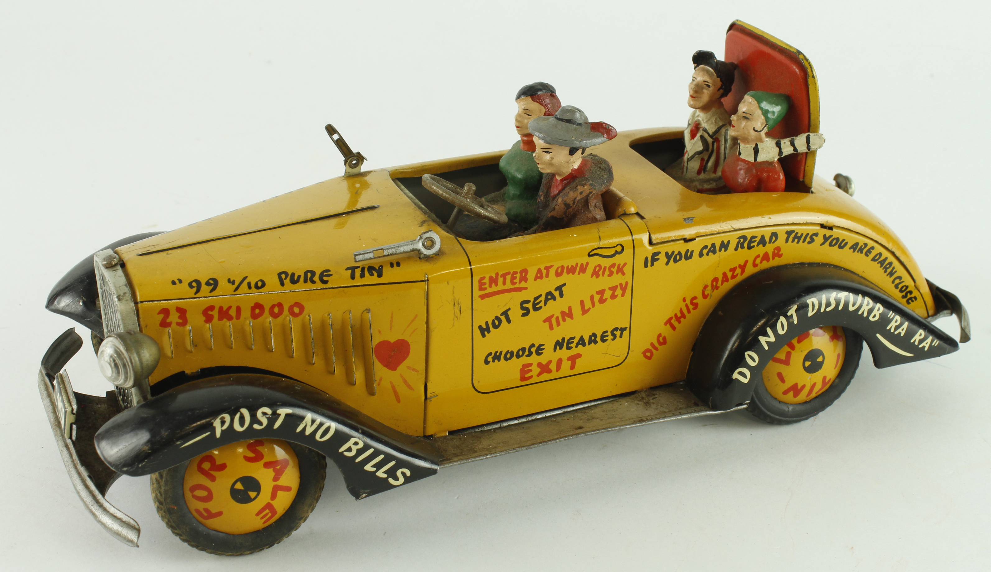 Arnold tinplate 'Tin Lizzy' open topped saloon car, length (sold as seen)