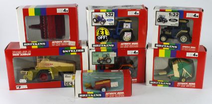 Britains. A group of seven boxed Britains 1:32 scale farm tractors and accessories, comprising 9495,