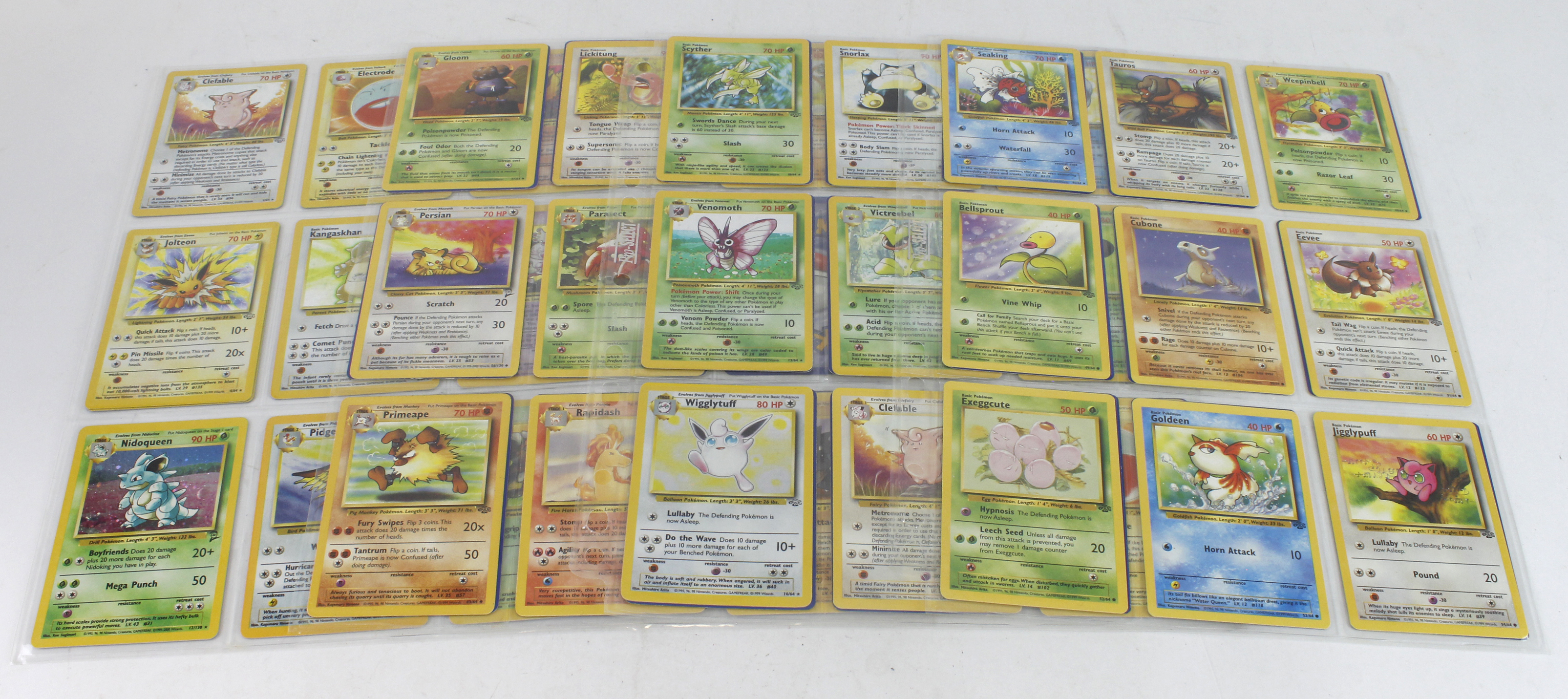Pokemon. A collection of sixty-three English Pokemon WOTC Jungle cards (missing card 42), circa 1995