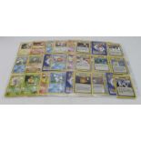 Pokemon. A collection of ninety English Pokemon WOTC Gym Heroes cards (90 of 132), circa 1995 -