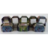 Pokemon. A collection of approximately 300 mixed Pokemon cards in tins, including holo and promo