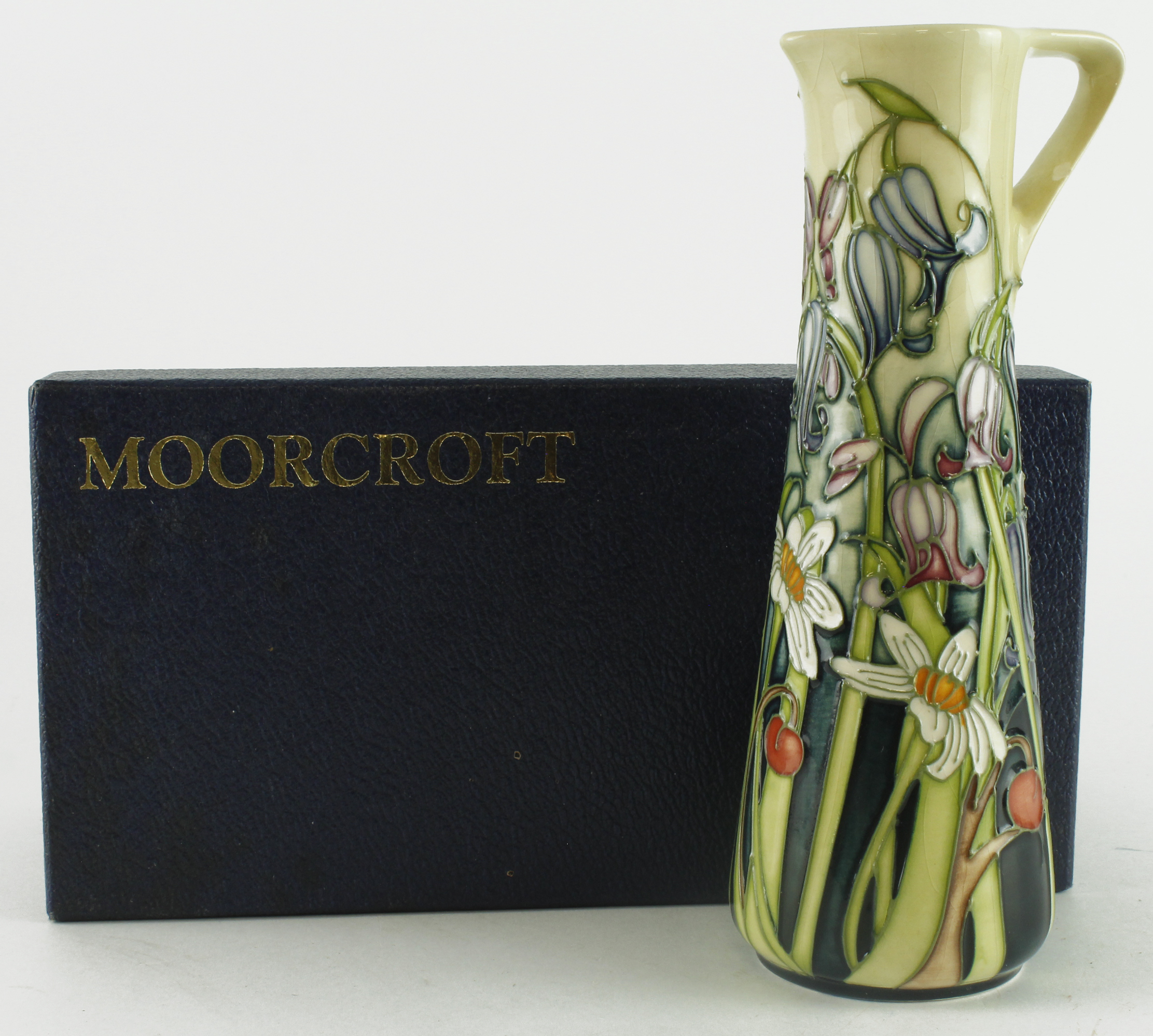 Moorcroft Wild Meadow pattern jug, height 18.5cm approx., contained in a Moorcroft box