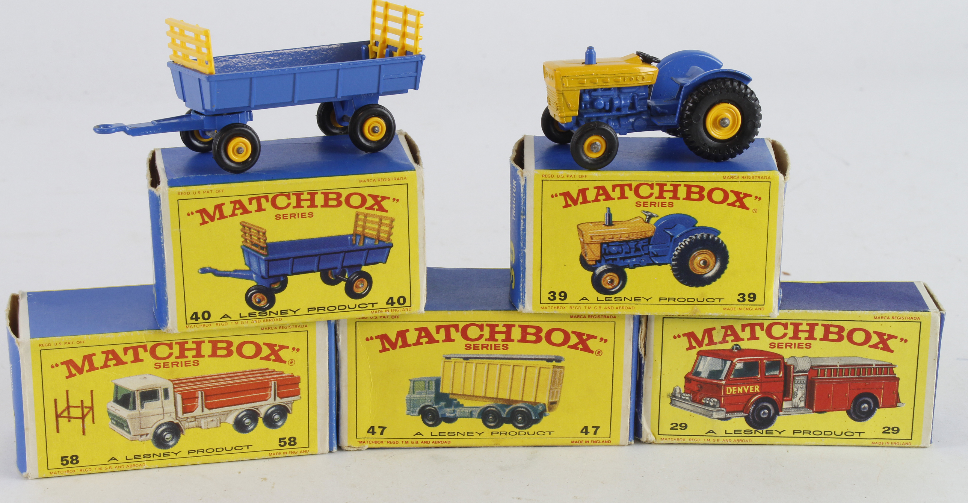 Matchbox. Five boxed Matchbox Lesney models, comprising Fire Pumper Truck (no. 29); Ford Tractor (