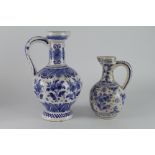 Delft. Two large blue & white jugs / ewers (one marked 'Delft' to base), tallest 30cm approx.