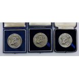 Agricultural interest. A group of three hallmarked silver Hereford Herd Book Society medallions,